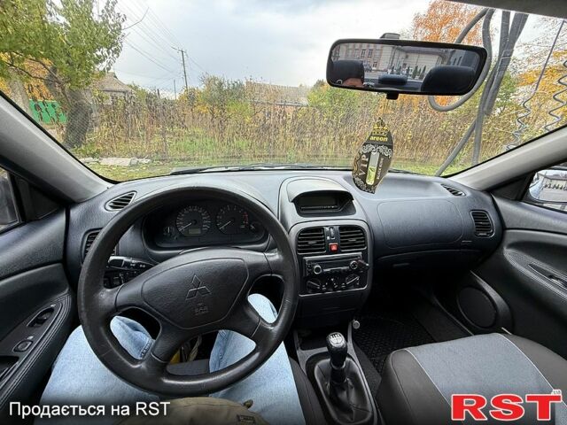 Міцубісі Харизма 2003 у Яготине на Automoto.ua Сірий Міцубісі Харизма, об'ємом двигуна 1.6 л та пробігом 184 тис. км за 3900 $, фото 11 на Automoto.ua