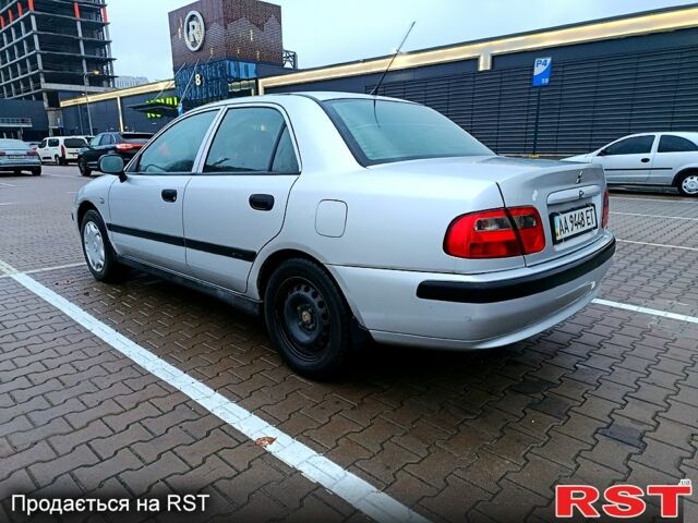 Серый Мицубиси Харизма, объемом двигателя 1.6 л и пробегом 212 тыс. км за 3700 $, фото 5 на Automoto.ua