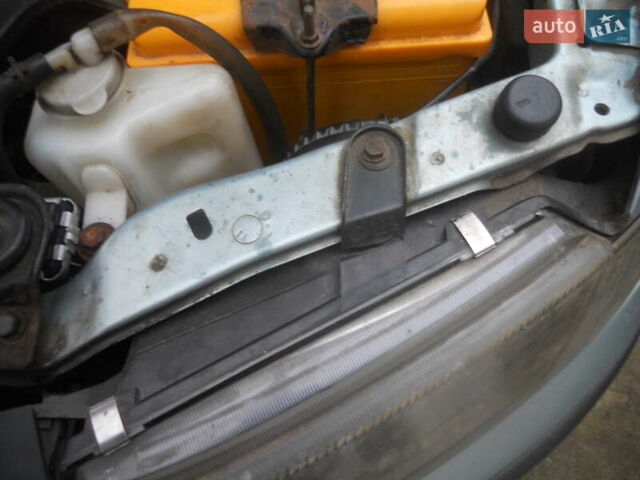 Сірий Міцубісі Харизма, об'ємом двигуна 1.6 л та пробігом 275 тис. км за 2450 $, фото 16 на Automoto.ua