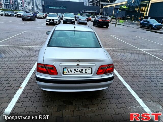 Серый Мицубиси Харизма, объемом двигателя 1.6 л и пробегом 212 тыс. км за 3700 $, фото 2 на Automoto.ua