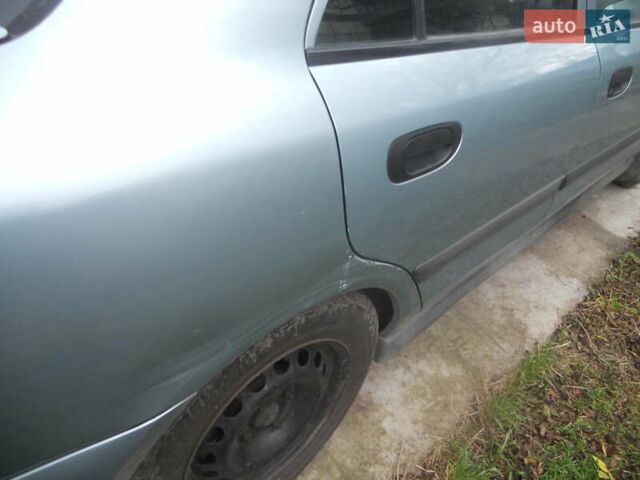 Сірий Міцубісі Харизма, об'ємом двигуна 1.6 л та пробігом 275 тис. км за 2450 $, фото 8 на Automoto.ua