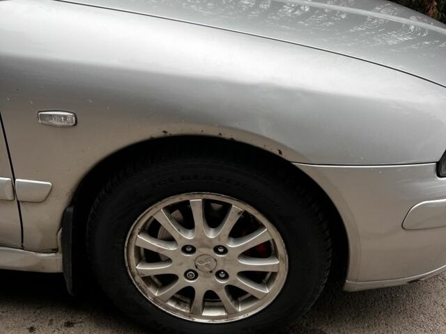 Сірий Міцубісі Харизма, об'ємом двигуна 1.6 л та пробігом 262 тис. км за 3700 $, фото 15 на Automoto.ua