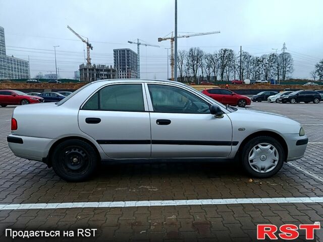 Серый Мицубиси Харизма, объемом двигателя 1.6 л и пробегом 212 тыс. км за 3700 $, фото 8 на Automoto.ua