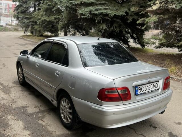 Сірий Міцубісі Харизма, об'ємом двигуна 1.6 л та пробігом 262 тис. км за 3700 $, фото 3 на Automoto.ua