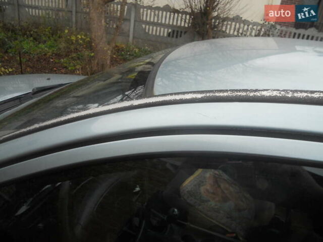 Сірий Міцубісі Харизма, об'ємом двигуна 1.6 л та пробігом 275 тис. км за 2450 $, фото 11 на Automoto.ua