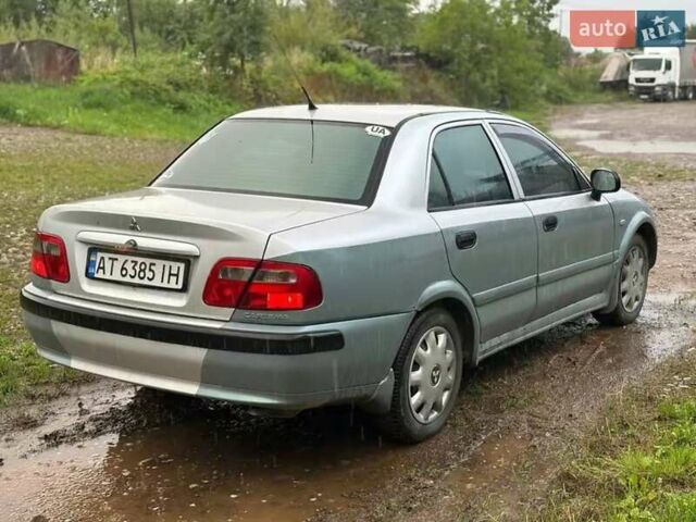 Сірий Міцубісі Харизма, об'ємом двигуна 1.6 л та пробігом 245 тис. км за 1700 $, фото 3 на Automoto.ua