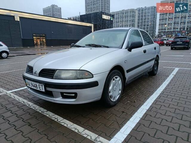 Сірий Міцубісі Харизма, об'ємом двигуна 1.6 л та пробігом 212 тис. км за 3700 $, фото 21 на Automoto.ua