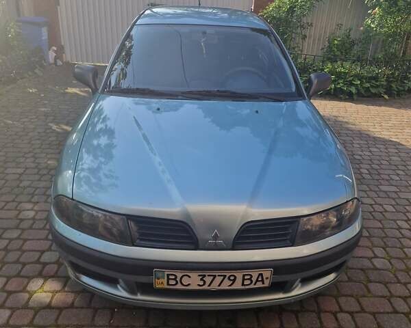 Серый Мицубиси Харизма, объемом двигателя 1.6 л и пробегом 286 тыс. км за 4800 $, фото 1 на Automoto.ua