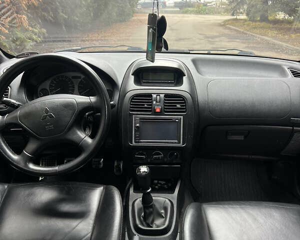 Серый Мицубиси Харизма, объемом двигателя 1.6 л и пробегом 267 тыс. км за 3700 $, фото 9 на Automoto.ua