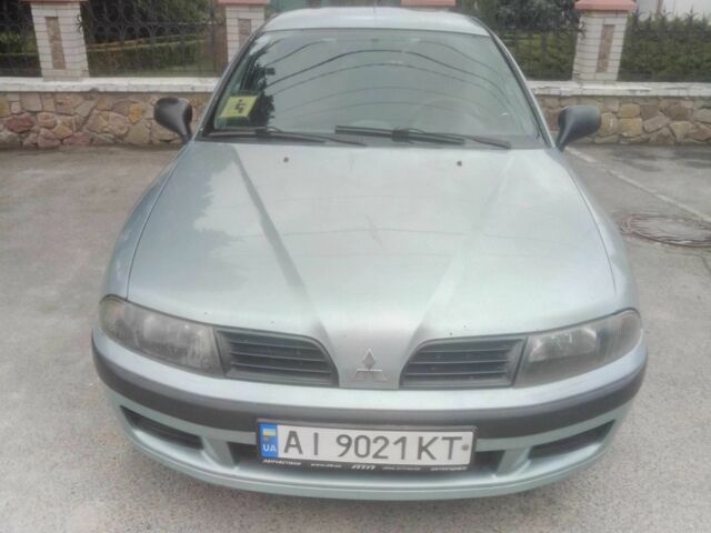 Сірий Міцубісі Харизма, об'ємом двигуна 0 л та пробігом 275 тис. км за 2309 $, фото 4 на Automoto.ua