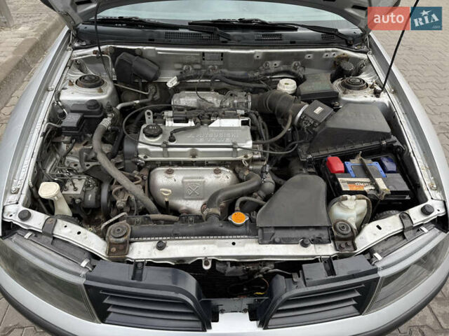 Серый Мицубиси Харизма, объемом двигателя 1.6 л и пробегом 184 тыс. км за 3900 $, фото 17 на Automoto.ua