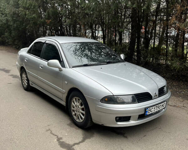 Серый Мицубиси Харизма, объемом двигателя 1.6 л и пробегом 267 тыс. км за 3700 $, фото 1 на Automoto.ua