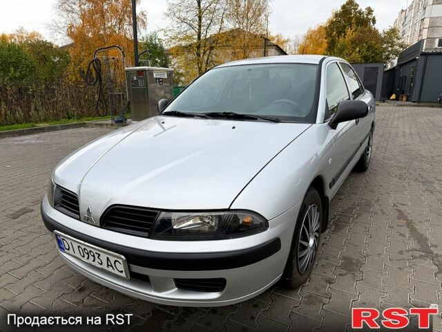 Сірий Міцубісі Харизма, об'ємом двигуна 1.6 л та пробігом 184 тис. км за 3900 $, фото 2 на Automoto.ua