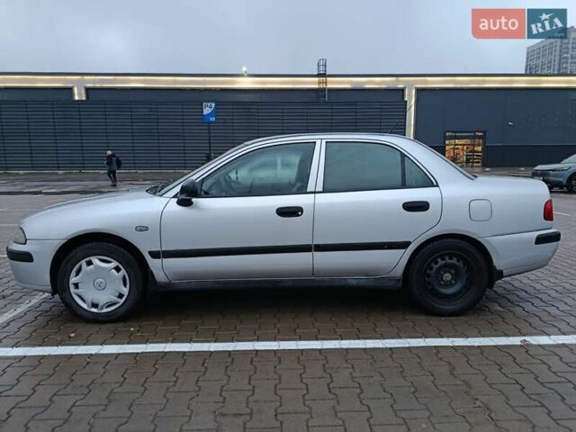 Сірий Міцубісі Харизма, об'ємом двигуна 1.6 л та пробігом 212 тис. км за 3700 $, фото 24 на Automoto.ua