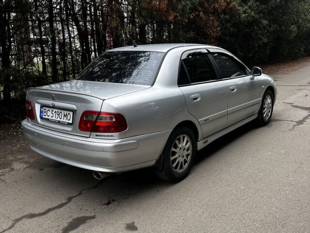 Сірий Міцубісі Харизма, об'ємом двигуна 1.6 л та пробігом 262 тис. км за 3700 $, фото 2 на Automoto.ua