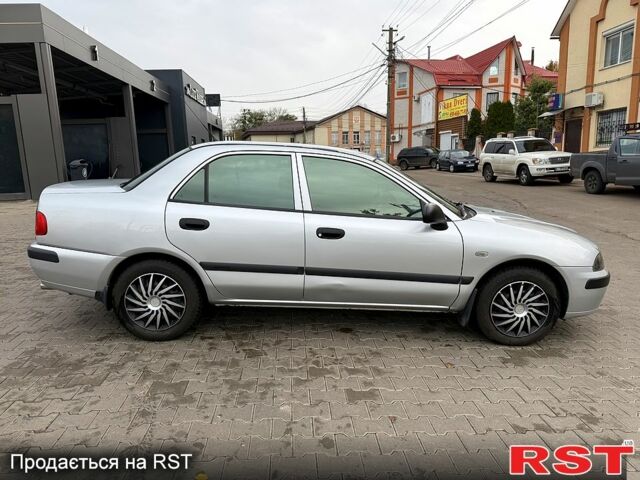 Міцубісі Харизма 2003 у Яготине на Automoto.ua Сірий Міцубісі Харизма, об'ємом двигуна 1.6 л та пробігом 184 тис. км за 3900 $, фото 7 на Automoto.ua