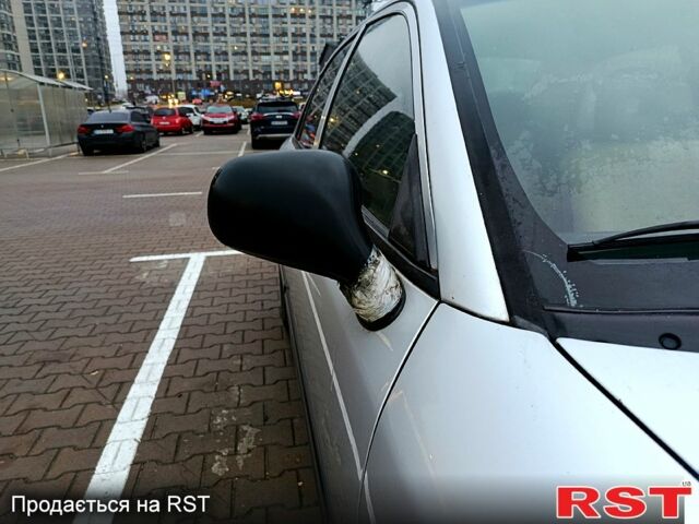 Серый Мицубиси Харизма, объемом двигателя 1.6 л и пробегом 212 тыс. км за 3700 $, фото 3 на Automoto.ua