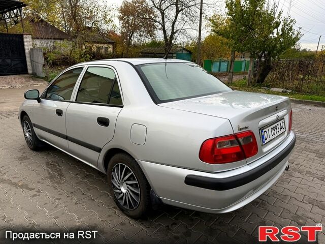 Сірий Міцубісі Харизма, об'ємом двигуна 1.6 л та пробігом 184 тис. км за 3900 $, фото 6 на Automoto.ua