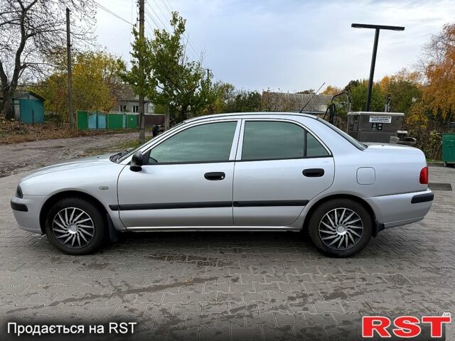 Міцубісі Харизма 2003 у Яготине на Automoto.ua Сірий Міцубісі Харизма, об'ємом двигуна 1.6 л та пробігом 184 тис. км за 3900 $, фото 4 на Automoto.ua
