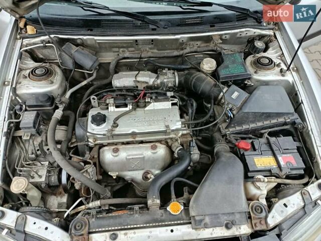 Сірий Міцубісі Харизма, об'ємом двигуна 1.6 л та пробігом 212 тис. км за 3700 $, фото 2 на Automoto.ua