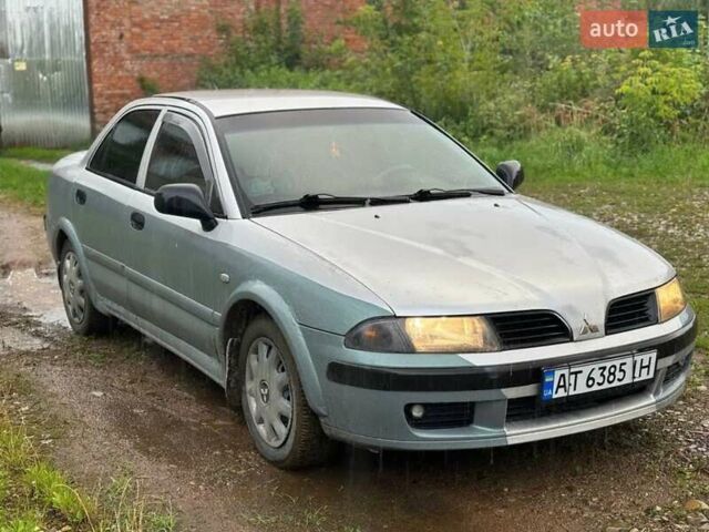 Сірий Міцубісі Харизма, об'ємом двигуна 1.6 л та пробігом 245 тис. км за 1700 $, фото 1 на Automoto.ua