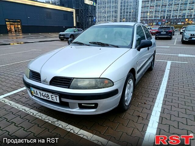 Серый Мицубиси Харизма, объемом двигателя 1.6 л и пробегом 212 тыс. км за 3700 $, фото 1 на Automoto.ua