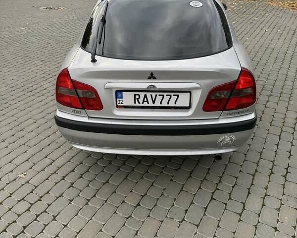 Сірий Міцубісі Харизма, об'ємом двигуна 1.83 л та пробігом 319 тис. км за 4500 $, фото 8 на Automoto.ua