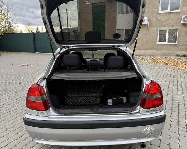 Сірий Міцубісі Харизма, об'ємом двигуна 1.83 л та пробігом 319 тис. км за 4500 $, фото 7 на Automoto.ua