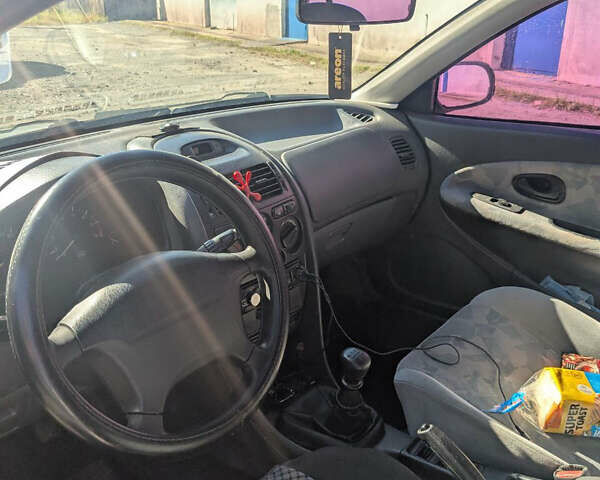 Серый Мицубиси Харизма, объемом двигателя 1.83 л и пробегом 415 тыс. км за 1999 $, фото 6 на Automoto.ua