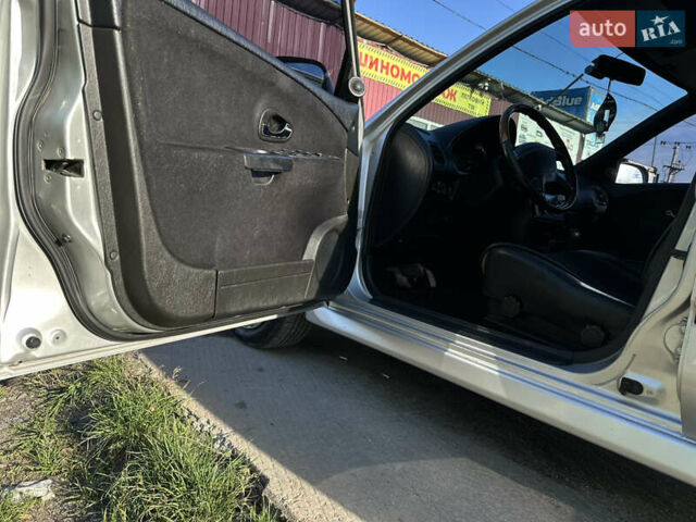 Сірий Міцубісі Харизма, об'ємом двигуна 1.83 л та пробігом 258 тис. км за 4200 $, фото 15 на Automoto.ua
