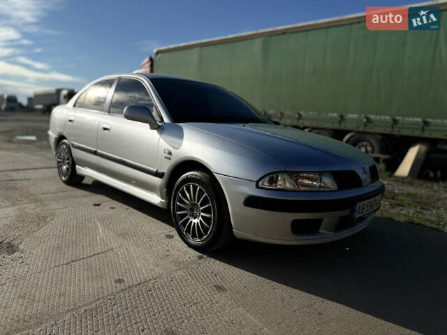 Сірий Міцубісі Харизма, об'ємом двигуна 1.83 л та пробігом 258 тис. км за 4200 $, фото 3 на Automoto.ua