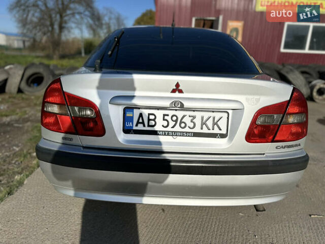 Сірий Міцубісі Харизма, об'ємом двигуна 1.83 л та пробігом 258 тис. км за 4200 $, фото 7 на Automoto.ua