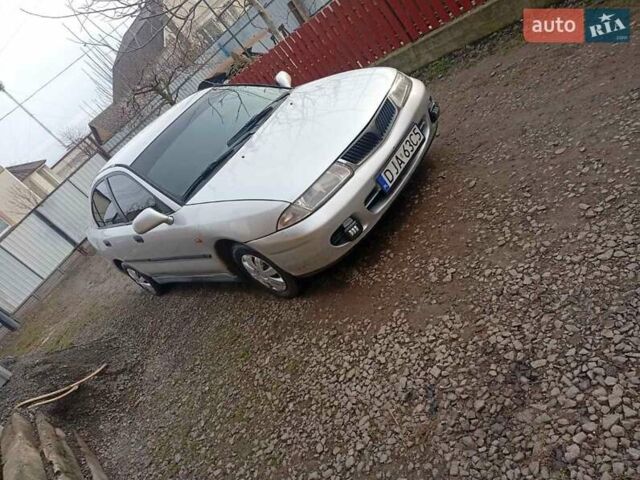 Серый Мицубиси Харизма, объемом двигателя 1.9 л и пробегом 65 тыс. км за 1650 $, фото 17 на Automoto.ua