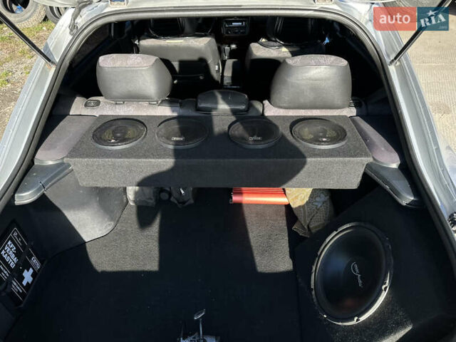 Сірий Міцубісі Харизма, об'ємом двигуна 1.83 л та пробігом 258 тис. км за 4200 $, фото 18 на Automoto.ua