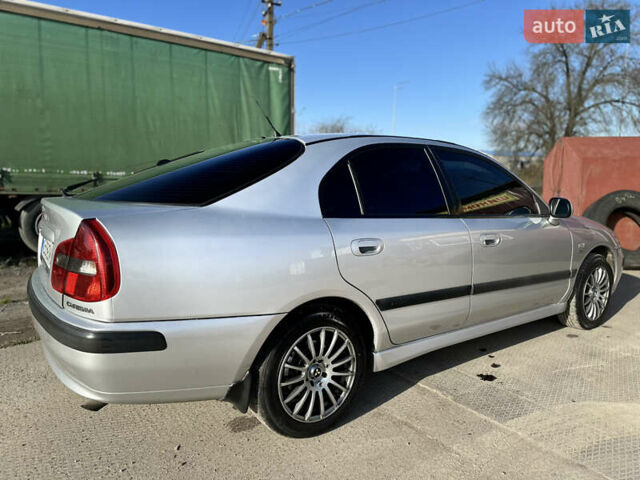 Сірий Міцубісі Харизма, об'ємом двигуна 1.83 л та пробігом 258 тис. км за 4200 $, фото 8 на Automoto.ua