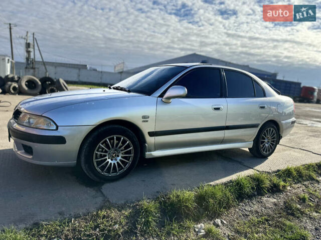 Сірий Міцубісі Харизма, об'ємом двигуна 1.83 л та пробігом 258 тис. км за 4200 $, фото 5 на Automoto.ua