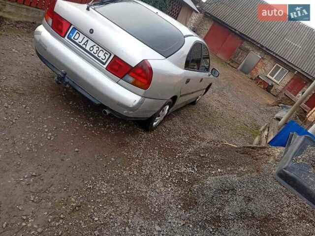 Серый Мицубиси Харизма, объемом двигателя 1.9 л и пробегом 65 тыс. км за 1650 $, фото 8 на Automoto.ua