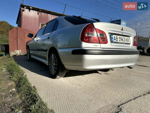 Сірий Міцубісі Харизма, об'ємом двигуна 1.83 л та пробігом 258 тис. км за 4200 $, фото 6 на Automoto.ua