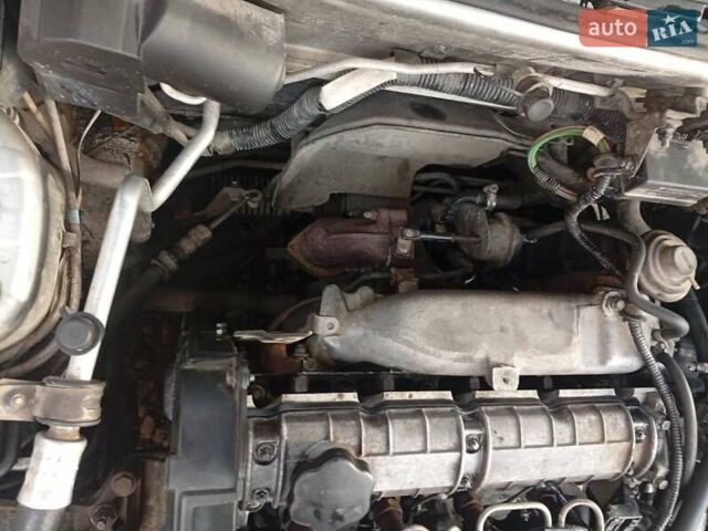 Серый Мицубиси Харизма, объемом двигателя 1.9 л и пробегом 65 тыс. км за 1650 $, фото 2 на Automoto.ua