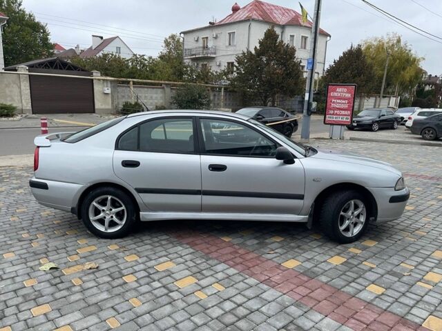 Мицубиси Харизма 2000 в Одессе на Automoto.ua Серый Мицубиси Харизма, объемом двигателя 1.8 л и пробегом 270 тыс. км за 2399 $, фото 2 на Automoto.ua