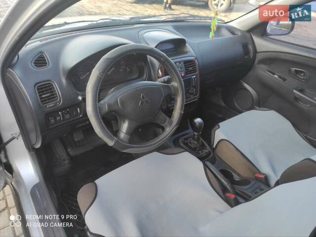 Сірий Міцубісі Харизма, об'ємом двигуна 1.6 л та пробігом 527 тис. км за 2200 $, фото 16 на Automoto.ua