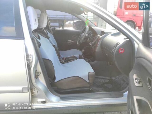Сірий Міцубісі Харизма, об'ємом двигуна 1.6 л та пробігом 527 тис. км за 2200 $, фото 9 на Automoto.ua