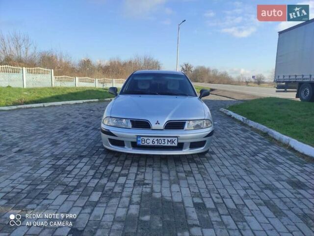 Сірий Міцубісі Харизма, об'ємом двигуна 1.6 л та пробігом 527 тис. км за 2200 $, фото 1 на Automoto.ua