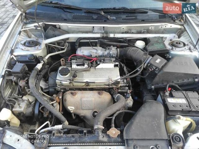 Сірий Міцубісі Харизма, об'ємом двигуна 1.6 л та пробігом 527 тис. км за 2200 $, фото 24 на Automoto.ua