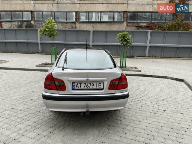 Сірий Міцубісі Харизма, об'ємом двигуна 1.6 л та пробігом 398 тис. км за 2500 $, фото 1 на Automoto.ua