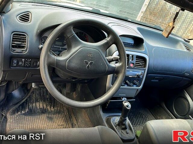 Сірий Міцубісі Харизма, об'ємом двигуна 1.9 л та пробігом 0 тис. км за 1800 $, фото 2 на Automoto.ua