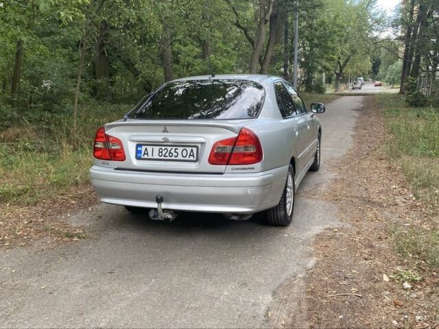 Серый Мицубиси Харизма, объемом двигателя 1.8 л и пробегом 265 тыс. км за 3500 $, фото 3 на Automoto.ua