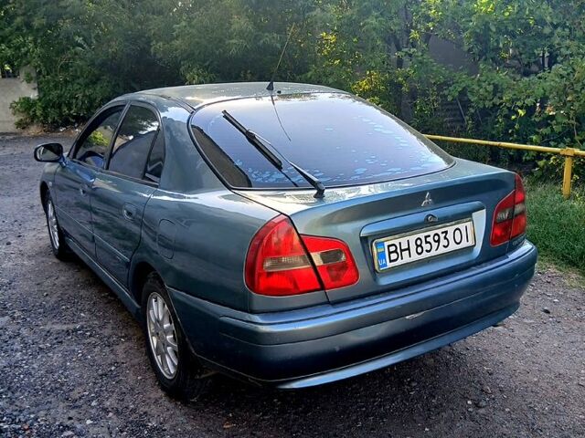 Серый Мицубиси Харизма, объемом двигателя 1.6 л и пробегом 267 тыс. км за 3500 $, фото 3 на Automoto.ua