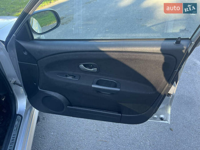 Серый Мицубиси Харизма, объемом двигателя 1.8 л и пробегом 214 тыс. км за 5650 $, фото 23 на Automoto.ua