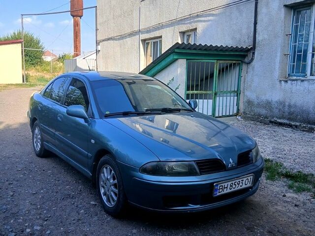 Серый Мицубиси Харизма, объемом двигателя 1.6 л и пробегом 267 тыс. км за 3500 $, фото 2 на Automoto.ua